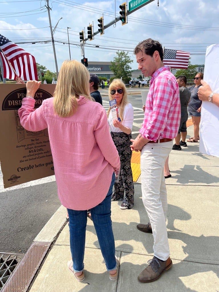 Mike Sacks talking with voters on Main Street discussing local issues in NY-17 district
